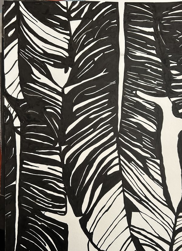 Bold black and white painting of banana leaves